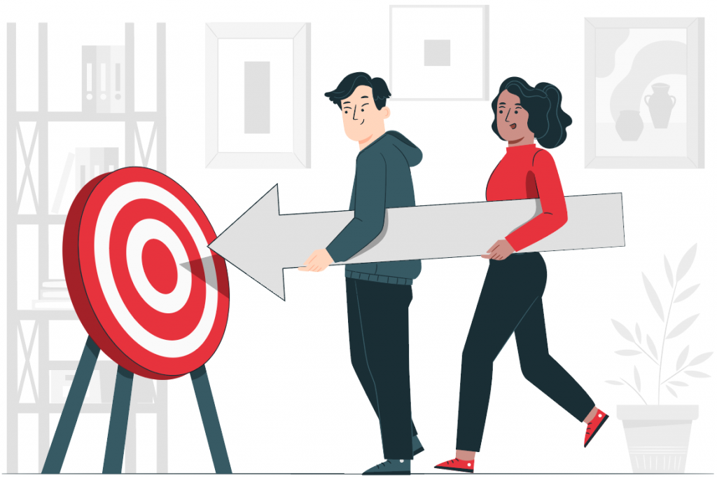 two people moving giant arrow towards target
